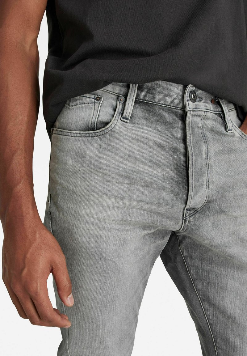 Herren Skinny Fit | G-Star SCUTAR 3D TAPERED Jeans Slim Fit sun faded glacier grey/grau - WM55904 Herren Skinny Fit | G-Star SCUTAR 3D TAPERED Jeans Slim Fit sun faded glacier grey/grau - WM55904