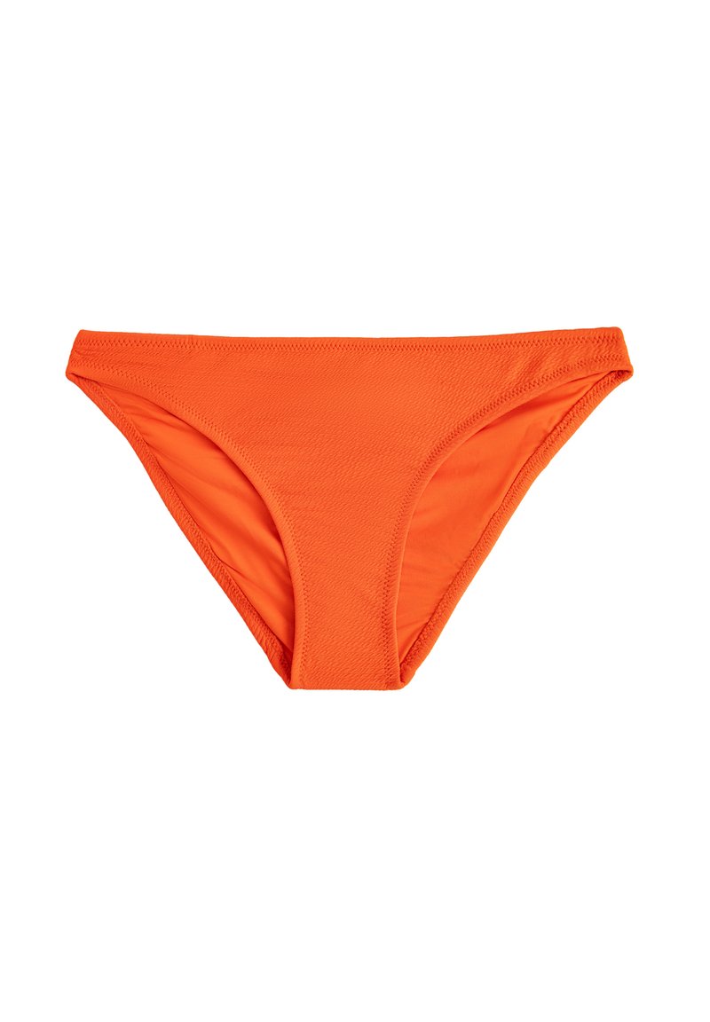 Slip della bikini arancione caratterizzato da un tessuto morbido e elastico con un taglio classico, senza motivi e bordi senza cuciture per comfort e vestibilità.
