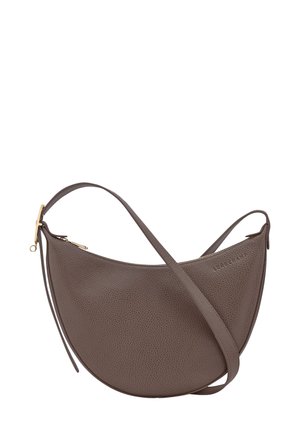 Brown pebbled leather crossbody bag with a curved shape, adjustable strap, and gold hardware accents. Features a zip closure.
