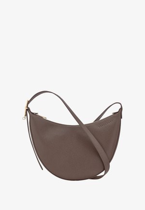 Brown pebbled leather crossbody bag with a curved shape, adjustable strap, and gold hardware accents. Features a zip closure.