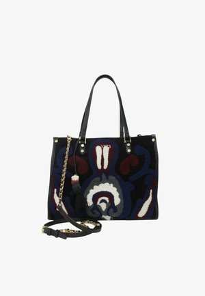 Tote bag met een bloemmotief, gemaakt van textuurstof met zwarte leren accenten. Beschikt over dubbele handvatten, een afneembare schouderband en een franjer.