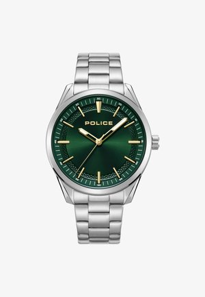 Reloj de hombre con una esfera verde, correa de metal plateado, marcadores de hora dorados y logotipo. Presenta un borde texturizado y manecillas luminosas.