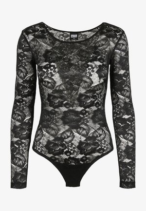 Schwarzer Spitzenbodysuit mit langen Ärmeln, floralen Mustern und U-Ausschnitt; verfügt am Boden über einen Tanga-Schnitt für eine figurbetonte Silhouette.