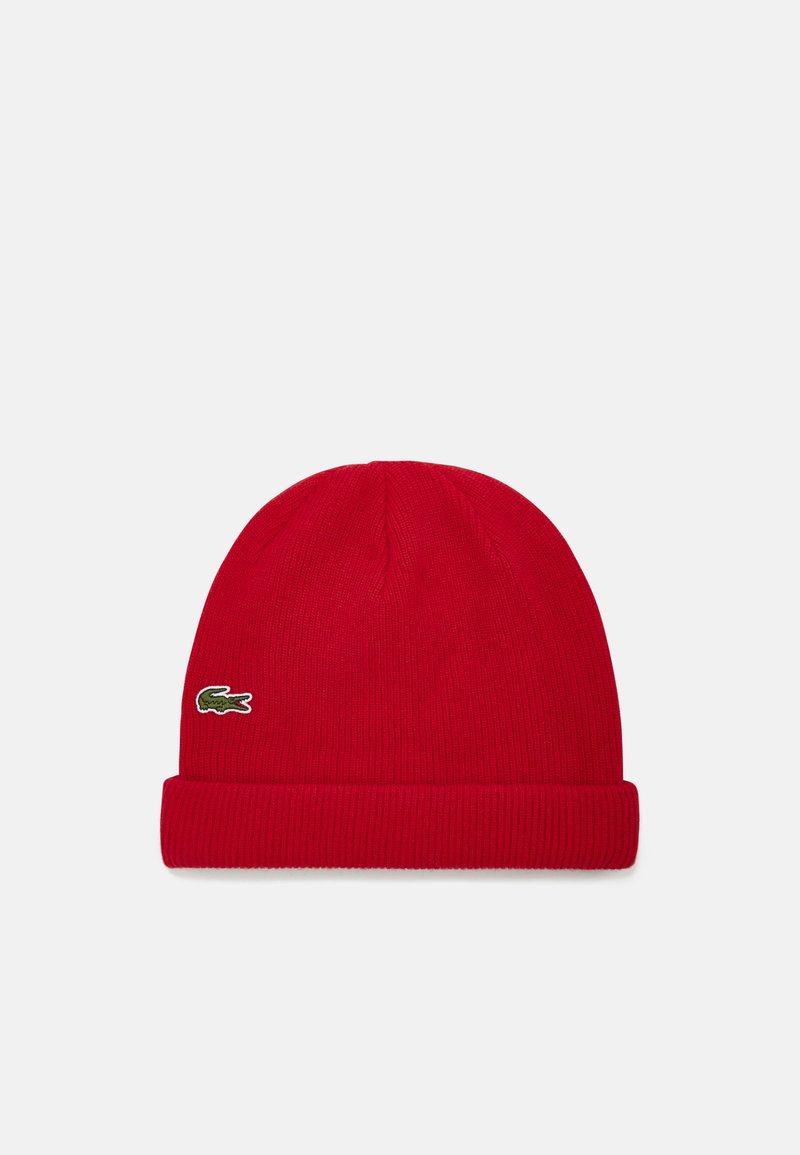 Beanie rosso a coste con risvolto e piccolo logo verde Lacoste sul lato. Tessuto morbido e forma aderente.