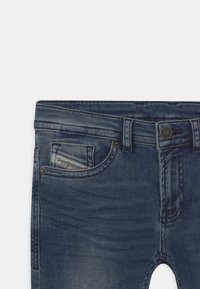 Diesel THOMMER UNISEX - Jeans slim fit - blue denim