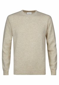 Stickad tröja i ljus beige, med rundad halsringning och långa ärmar. Mjuk textur med subtila prickar genom tyget.