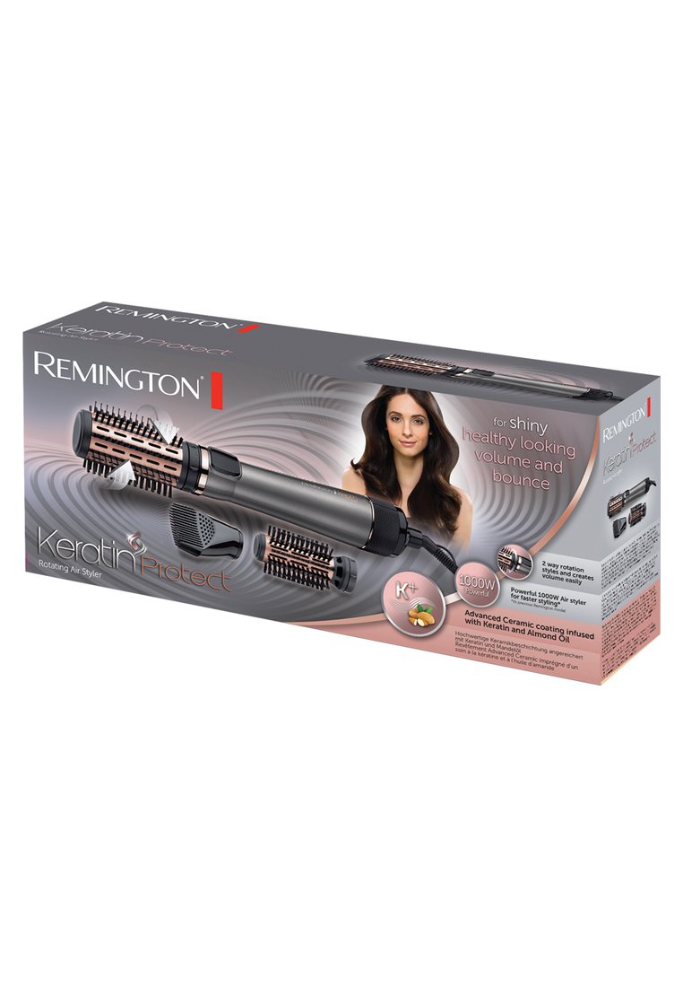 Styler à air rotatif Remington Keratin Protect avec trois brosses, montrant une femme avec des cheveux brillants et volumineux sur l'emballage.