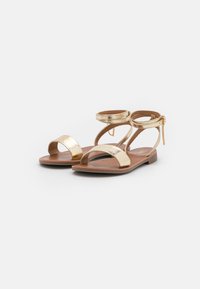 ONLY SHOES Varrelliset sandaalit - gold-coloured