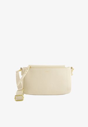 Cream leather crossbody bag with a textured finish, gold hardware accents, adjustable strap, and zippered top closure.