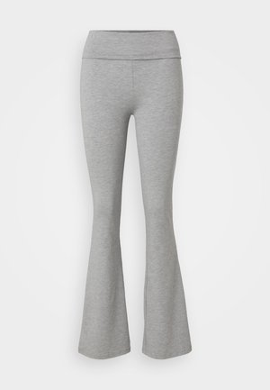 Pilkos flared kelnės, pagamintos iš minkštos medvilnės mišinio medžiagos. Savybės: platus juosmuo ir lygus paviršius, suteikiantis laisvą prigludimą.