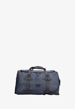 Sac de sport bleu marine avec poignées en cuir noir, bandoulière réglable et fermeture à double fermeture éclair sur le dessus.