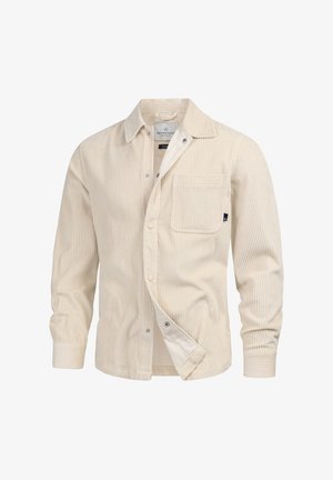 Camicia in corduroy beige con colletto, tasche frontali e chiusura a bottoni. Presenta delle righe verticali e una trama morbida.