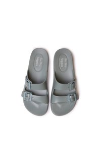 Gray plastic sandals featuring two adjustable straps with buckles, textured footbed, and smooth sole. Suitable for casual wear.