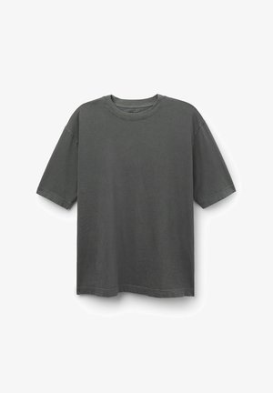 Korte mouwen t-shirt in donkergrijs, gemaakt van zachte katoen, met een ronde hals en een ontspannen pasvorm met gestikte zoom. Geen patronen of accenten.