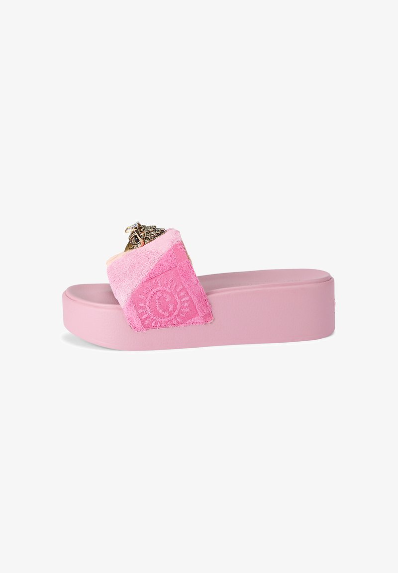 Pink platform slide sandal with embroidered pink fabric strap and gold decorative charm on a white background.
