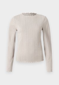 Langarmshirt in lichtbeige met een geribbelde textuur. Heeft een scalloped halslijn en een subtiele glans door de stof.