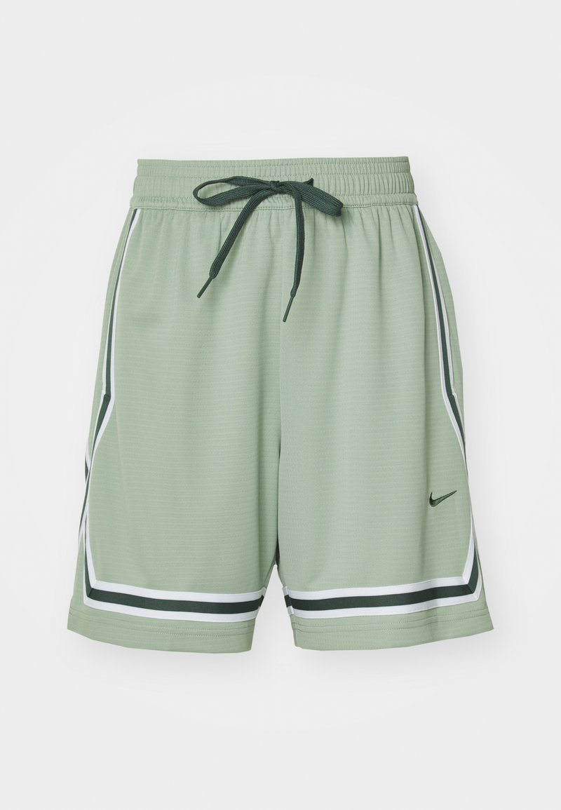 Heled roheline Nike lühike püks, millel on tekstureeritud kangas, elastne vöökoht, nöör ja valged ning tumerohelised külgtriibud.