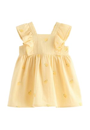 Gul kjole til småbørn med voluminøse skulderstropper og små broderede citronmønstre på et rynket skørt.