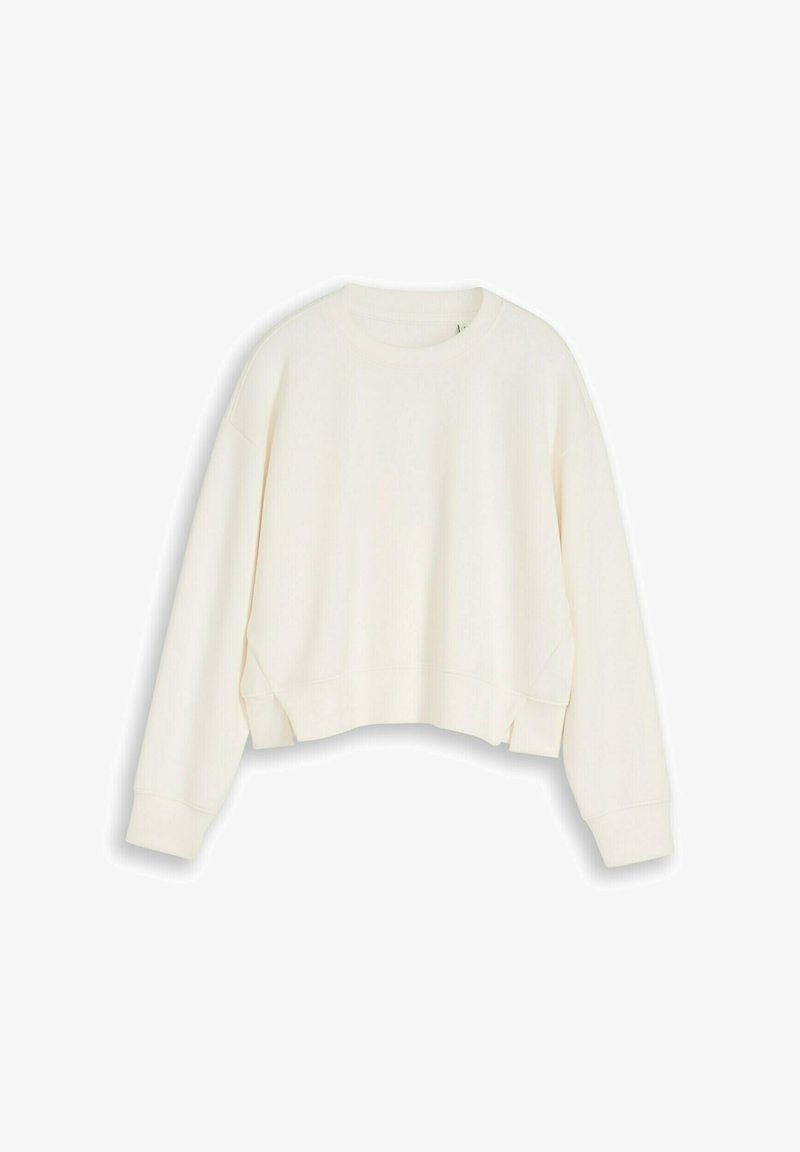 Sweat-shirt crème à manches longues avec col rond, poignets et ourlet côtelés, présenté à plat sur un fond blanc.