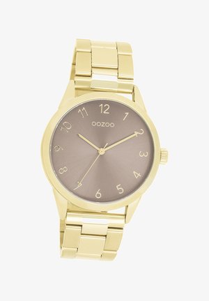 Montre en métal doré avec un boîtier rond, un cadran marron mat, des indicateurs horaires dorés et un bracelet à maillons. Présente une surface texturée.