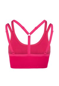 Roze sportbeha met verstelbare banden, geribbelde textuur en een brede band met het reliëf logo "GORILLA WEAR". Kruisachterkant ontwerp.