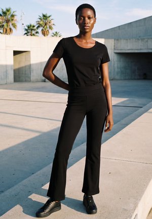 aim’n® EASE RIBBED - Pantaloni - black