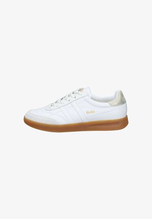 White leather sneaker with gum sole, gold logo on side, white laces, and metallic gold heel accent.
