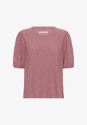 Różowa bluzka z krótkim rękawem, wykonana z teksturowanej tkaniny z wzorami dziurkowanymi. Posiada okrągły dekolt oraz bufiaste rękawy z elastycznymi mankietami.