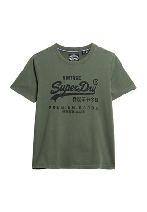 T-shirt en coton olive avec des manches courtes, un col rond et un imprimé noir présentant le texte « Vintage SuperDry » et le design texte « Premium Goods ». 