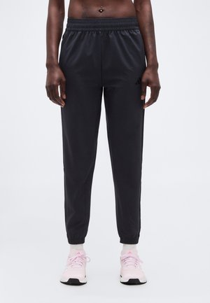 - Spodnie treningowe