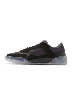 Black sneaker with a mix of suede and mesh materials, featuring a clear rubber sole, geometric design, and subtle purple accents.