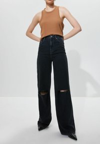 Next LOOSE WIDE  - Kavbojke na trapez - washed black