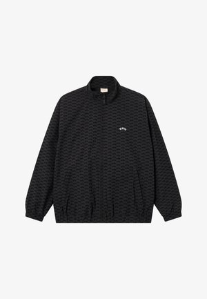 Black zip-up jacket with a stand collar, featuring an all-over logo pattern, elastic cuffs, and a relaxed fit.