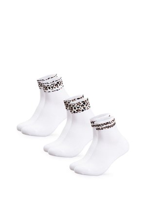 Three pairs of white ankle socks with leopard print trim displayed on a plain white background.