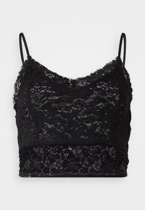 Črne čipkaste bralette z nastavljivimi trakovi, cvetnim čipkastim vzorcem in enobarvnim črnim pasom na dnu.