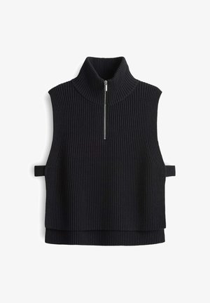 Gilet sans manches en tricot noir à côtes avec col haut et demi-fermeture éclair à l'avant, comportant des boucles latérales et un ourlet superposé.