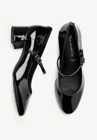 Black patent leather block-heeled shoes with a rounded toe and adjustable ankle strap. Smooth texture with minimal detailing.