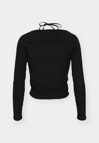 Schwarzes Langarmoberteil aus geribtem Stoff, mit taillierter Passform und einer Schleife am Nacken hinten. Glatte Textur mit leichtem Stretch.