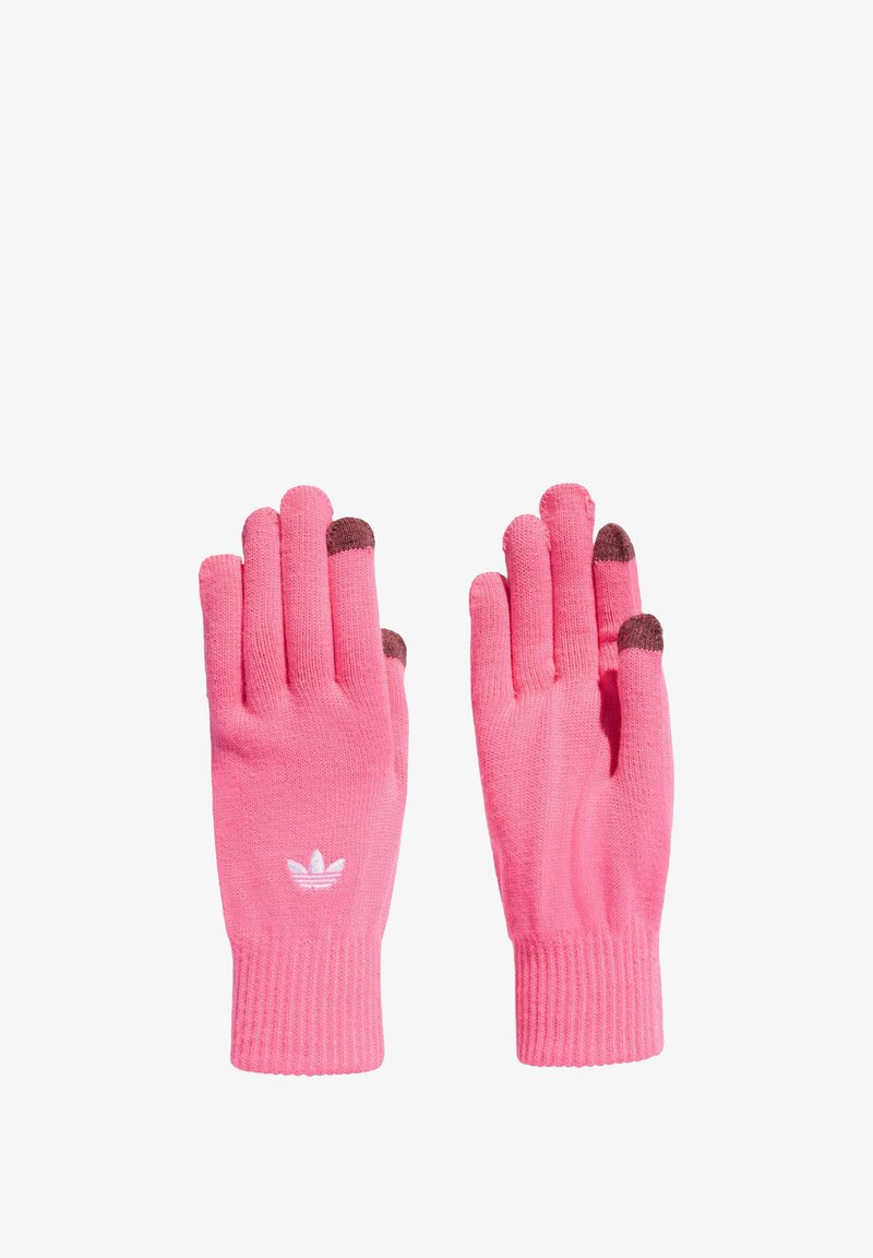 Lyserøde strikkede handsker med ribbede mansjetter, der har et hvidt logo og brune fingerspidser til touchscreen-kompatibilitet.