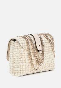 Cream tweed handbag with gold threading, featuring a gold chain strap and a smooth leather accent on the top. Rectangular shape.