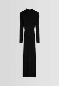 Abito lungo a maniche lunghe nero con costine, caratterizzato da un collo alto e bottoni laterali per un tocco di stile. Silhouette aderente e texture liscia.