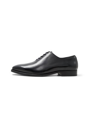 Black leather dress shoe with a sleek, rounded toe and a low heel. Features lace-up closure and a shiny finish. Smooth texture throughout.