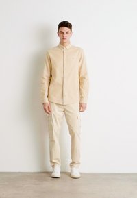 Tommy Jeans SHIRT - Shirt - newsprint