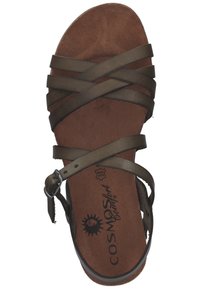 Brown sandal with crisscrossed dark brown straps, a textured footbed, and a small metal buckle. "COSMOS comfort" logo printed on footbed.