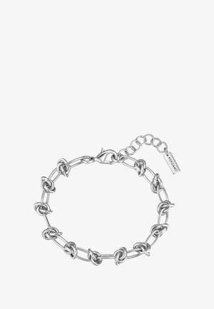 Brăță de argint cu lanț format din linkuri ovali alternante și inele în formă de nod, cu clapetă de homar și extensie ajustabilă cu etichetă de marcă.