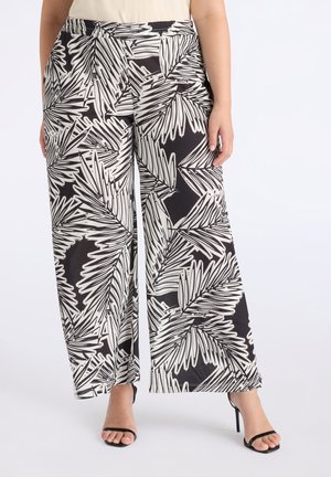 Pantalones de pierna ancha en blanco y negro con un patrón de hojas de palma. Fabricados con un tejido ligero y con una cinturilla elástica para mayor comodidad.