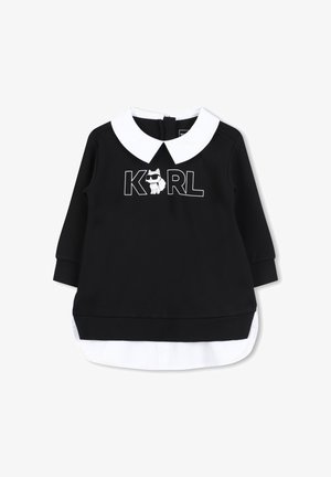 Zwarte sweatshirt met witte kraag, met een "KARL" logo en hondenschema. Lange mouwen, gelaagd ontwerp met witte zoomdetails.