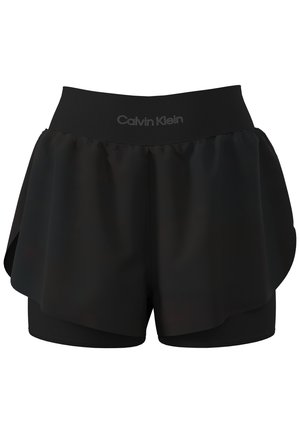 Shorts de sport pour femmes noirs à couches multiples avec une large ceinture affichant le logo "Calvin Klein" au centre devant.