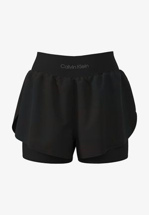 Shorts de sport pour femmes noirs à couches multiples avec une large ceinture affichant le logo "Calvin Klein" au centre devant.