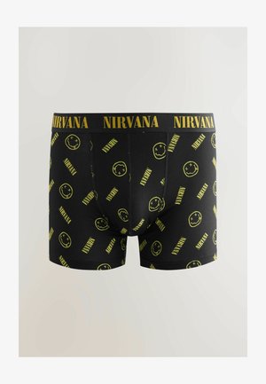 Melni bokseršortai ar dzelteno "NIRVANA" tekstu un smaidošu seju rakstu. Izgatavoti no mīkstas auduma, ar elastīgu jostu komfortam.